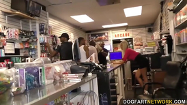 Adult store interracial gang bang with a blonde hoe